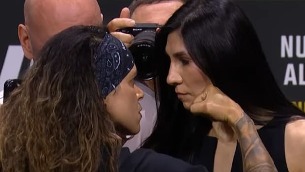 Amanda Nunes and Irene Aldana stare down at the conclusion of the UFC 289 pre-fight press conference.